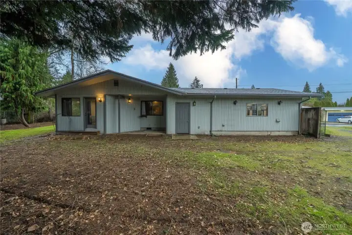 The back of the home has a covered patio.