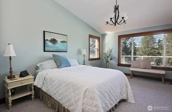 generous sized ensuite primary with golf course views