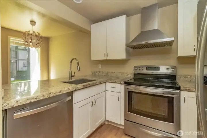 Remodeled kitchen with granite countertops