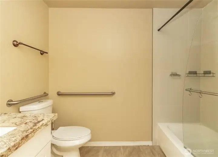 Remodeled bathroom with granite countertop