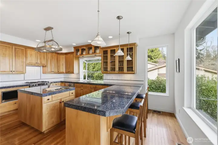 The kitchen is the perfect place to cook or to just hang out and watch the cook.