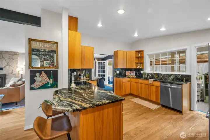 Refreshed kitchen with new counters, sink, and BRAND new fridge.