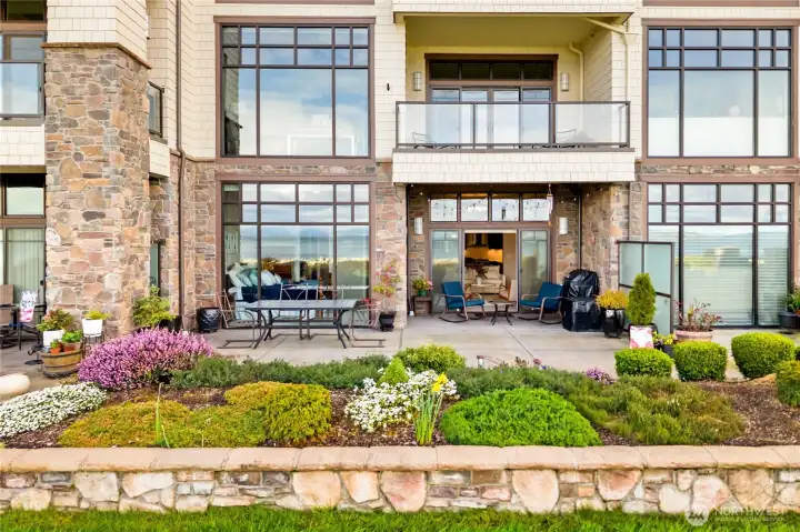 Large outdoor entertaining space gives you enough room to sit by a fire and enjoy a meal with friends and family by the water.