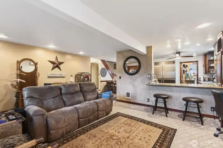 living room with bar eating area