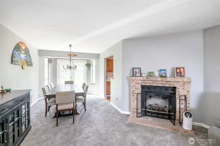 Living room with wood burning fireplace
