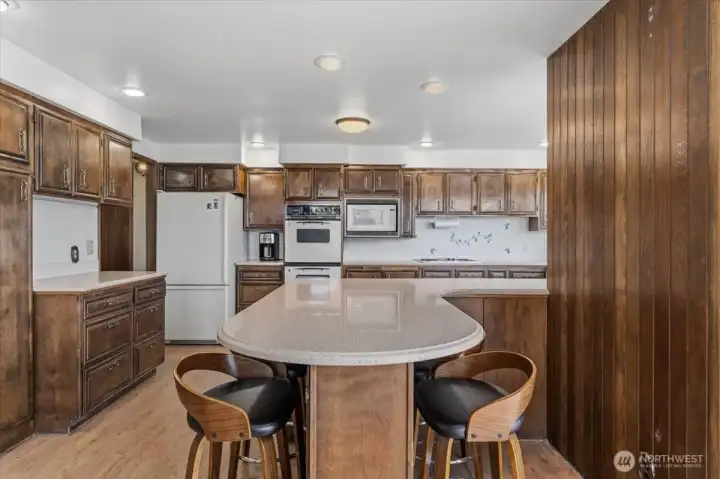 Kitchen with built in eating bar