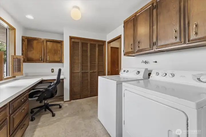 Main floor laundry and built in desk