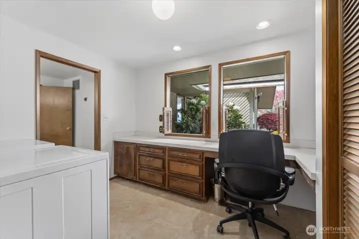 Main floor laundry and built in workspace/desk