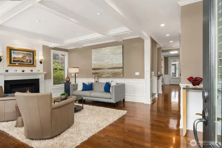 Coffered Ceilings and warm fireplace compliment living area Coffered Ceilings and warm fireplace compliment living area