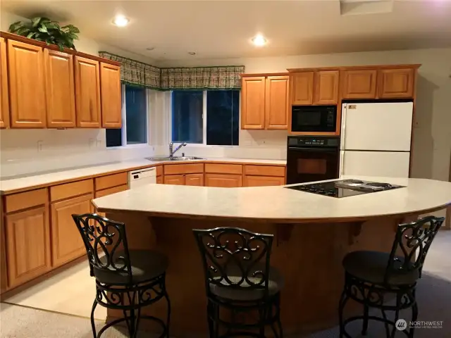 UNIT A Mirror image layout as unit B with big island and open space living room, New BLACK refrigerator and Dishwasher to match microwave and oven.