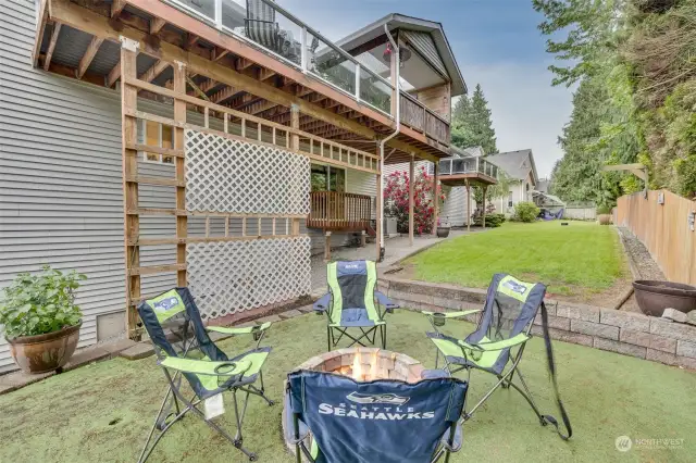 Unit B fire Pit area. It use to be a putting green and could be turn back into that with a little TLC.