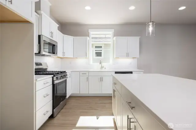 Nice bright kitchen w/ a window over the sink.
