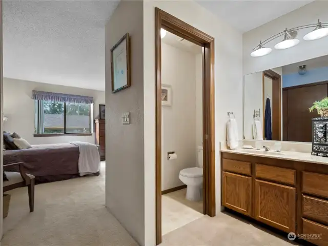 This condo features a private primary bathroom.