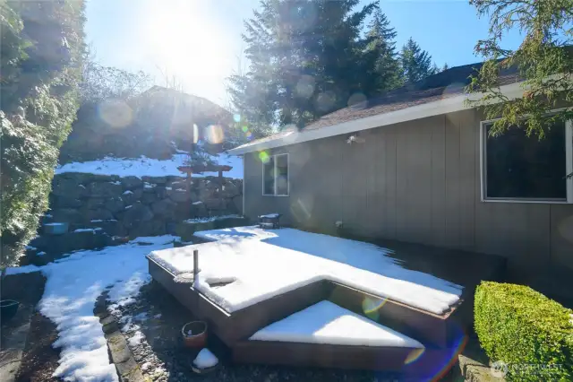 Thoughtful landscaping has transformed this backyard into a low-maintenance retreat, allowing you to enjoy the beauty of nature without the hassle of constant upkeep.