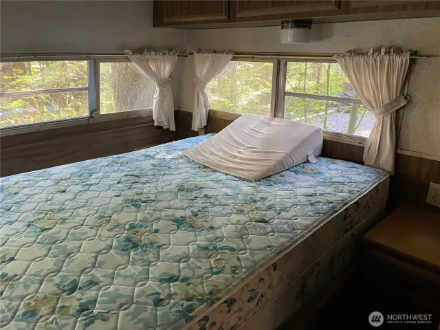 Primary bedroom in back of trailer.