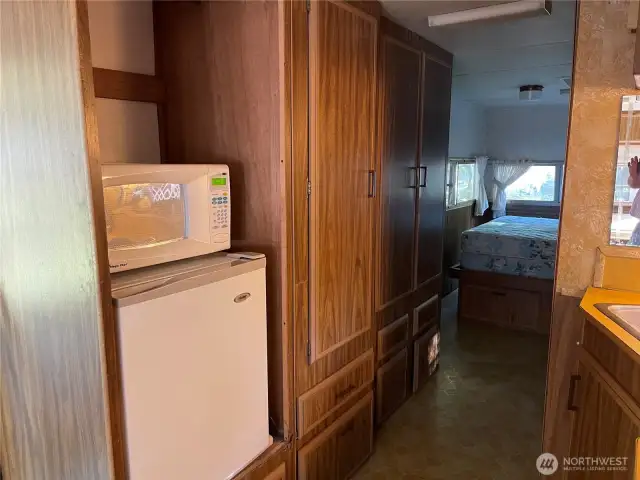 Has apartment size refrigerator.