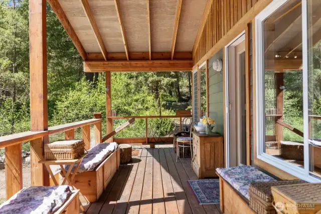 South-facing porch has a big enough overhang to keep the sun from overheating the cabin in summer, and keeps the rain and snow well away from the entry in the winter.