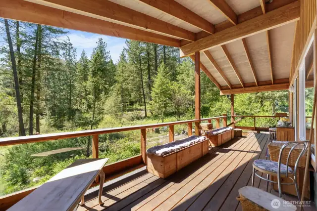 This porch is a delightful place to sit for hours, and is big enough to hold many friends. Hummingbirds also love this porch when feeders are out!