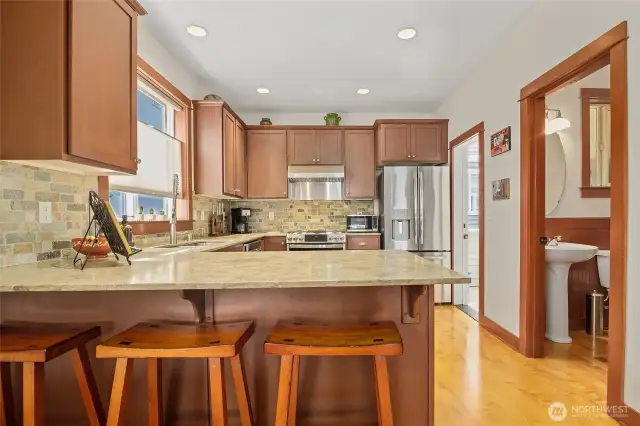 Another angle of the whole kitchen.  Guest bath to right.  There is also a little deck off the kitchen that sellers use as a pantry, recycle, etc.  It's brilliant!