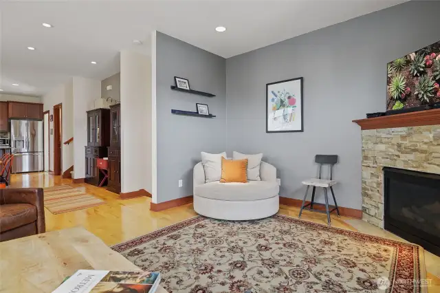 This shows the other corner of the living room and into the dining room with room for a huge hutch (or two medium ones)!