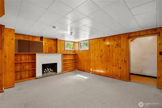 Spacious rec room has good ceiling height