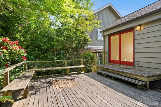 Decks opens to a beautiful back yard.