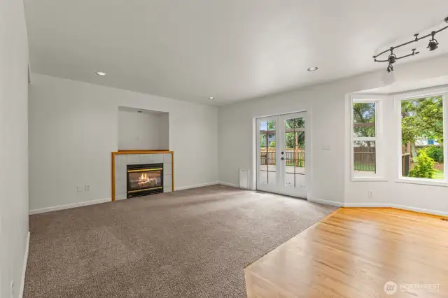 Open-Concept Family Room Overlooking Kitchen and Dining