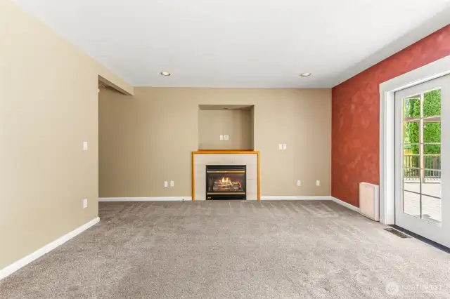 Family Room with French Doors Leading to Deck & Backyard