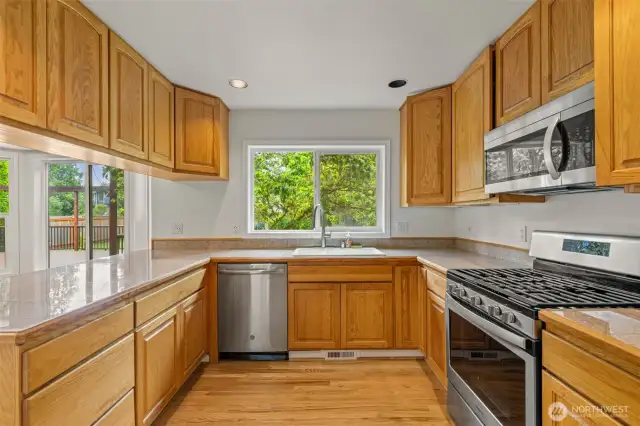 Central Kitchen with Ample Cabinetry & Prep Space