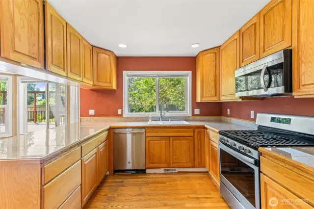 Kitchen with dishwater, microwave & gas range