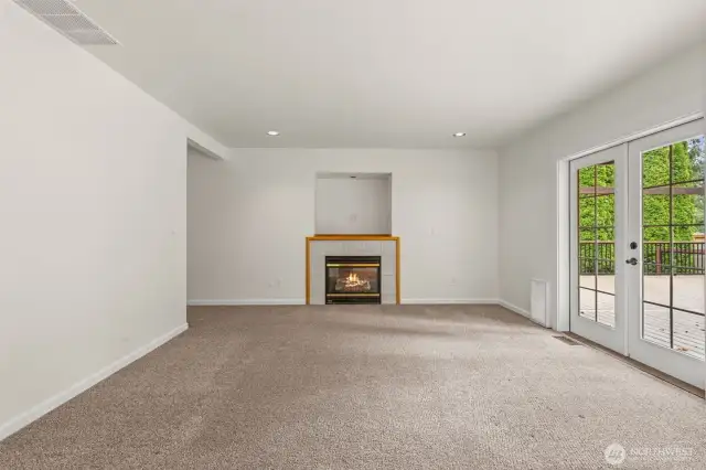 Family Room Featuring Direct Access to Deck & Backyard Retreat