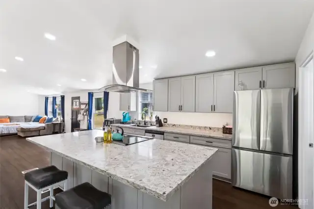 Gorgeous updated kitchen and all appliances stay!