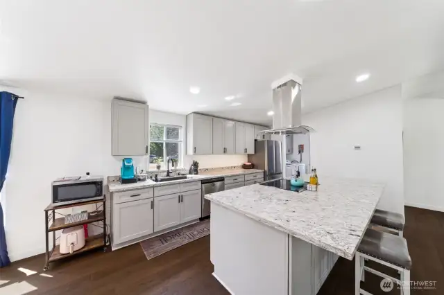 Laundry room/ mud room just off kitchen with pantry shelves
