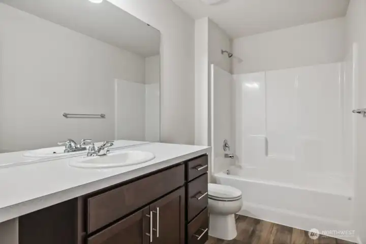 Photos are of the same floor plan in a different community. Finishes may vary.