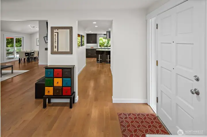 The entry with hardwoods welcomes you home