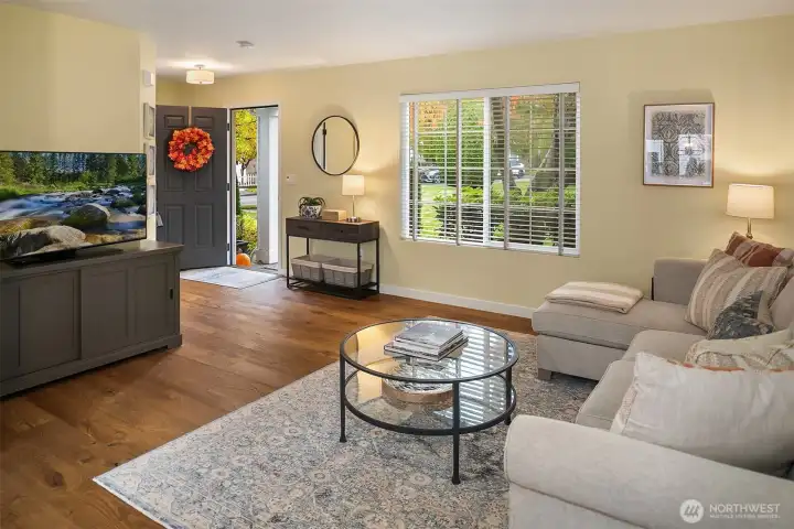 Hardwood floors, new trim, blinds and lighting