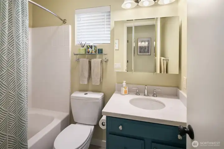 Second full bathroom with heated floors and new vanity