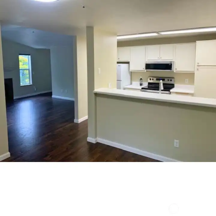 Kitchen with a breakfast bar.