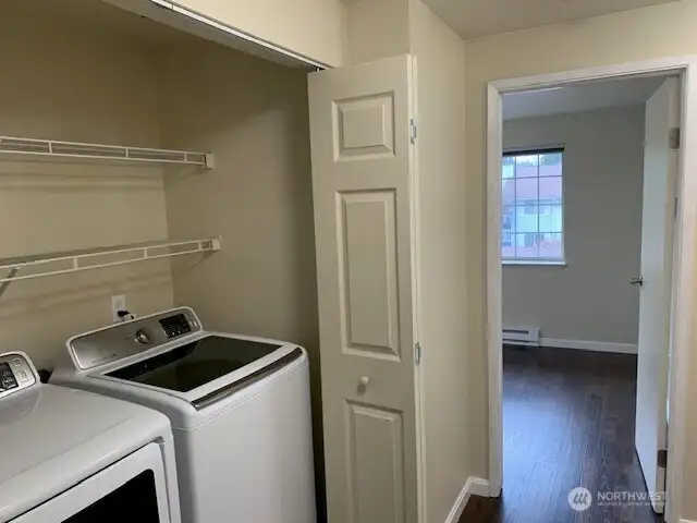 Full sized washer and drier included.