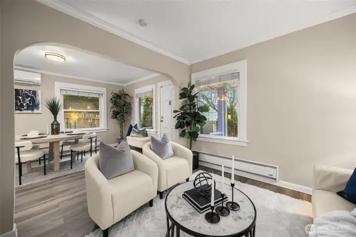 Layout includes a cozy living and dining space at the front of the home