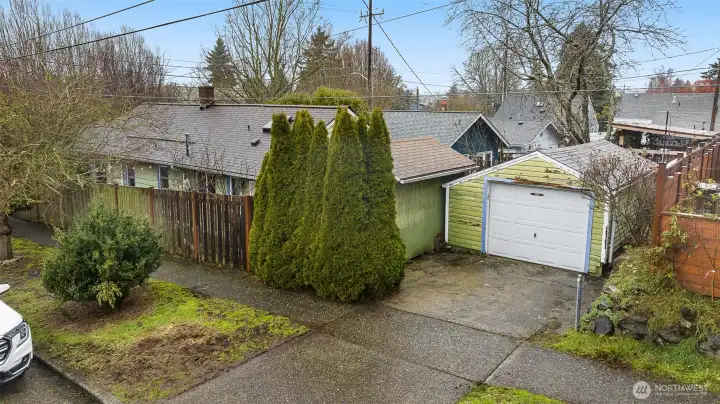 Detached garage and shed are located on the 46th side