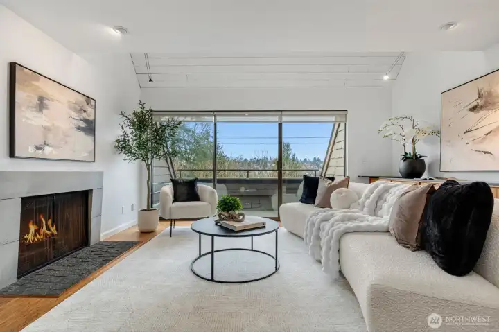 Wood burning fireplace and nice deck with great view.