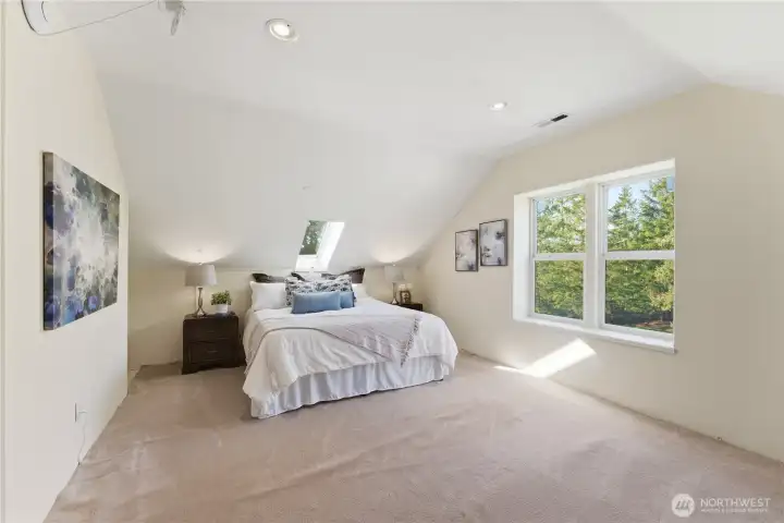 The north unfinished bedroom includes electrical, central vacuum, two skylights with electric shades, a large double-hung window, and plumbing roughed-in for a bathroom