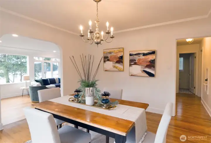 Notice the classic details in the dining room that opens to sunken living room