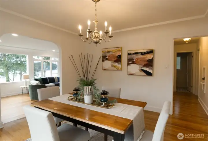 Notice the classic details in the dining room that opens to sunken living room