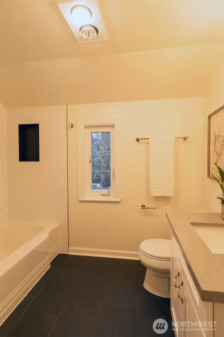 Upstairs full bathroom with slate floors