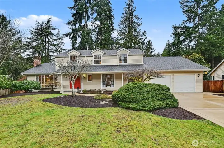 East facing home with great curb appeal in the brightest cul-de-sac of Bridle Trails