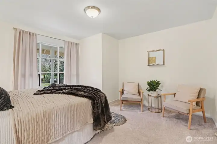 Just off the living area is a main floor den/additional bedroom