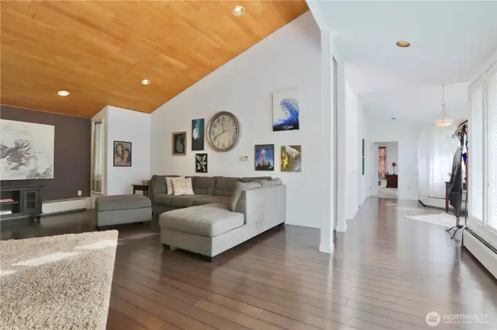 Living room looking toward entry and primary bedroom