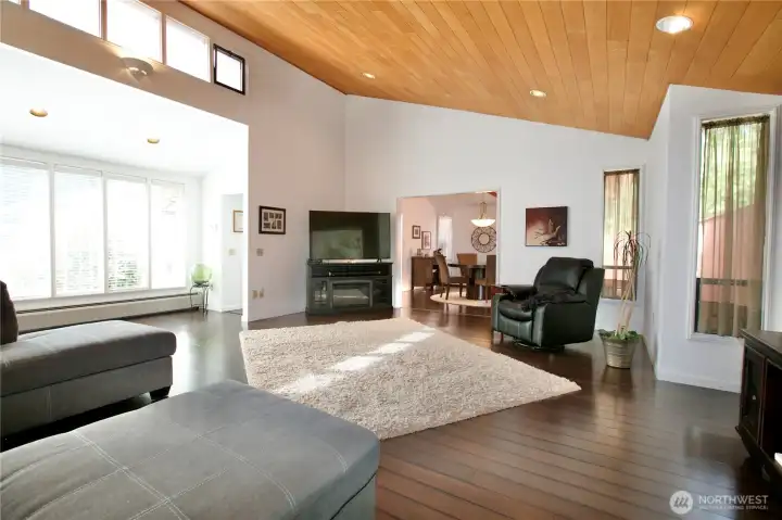 Living room looking toward kitchen and family room